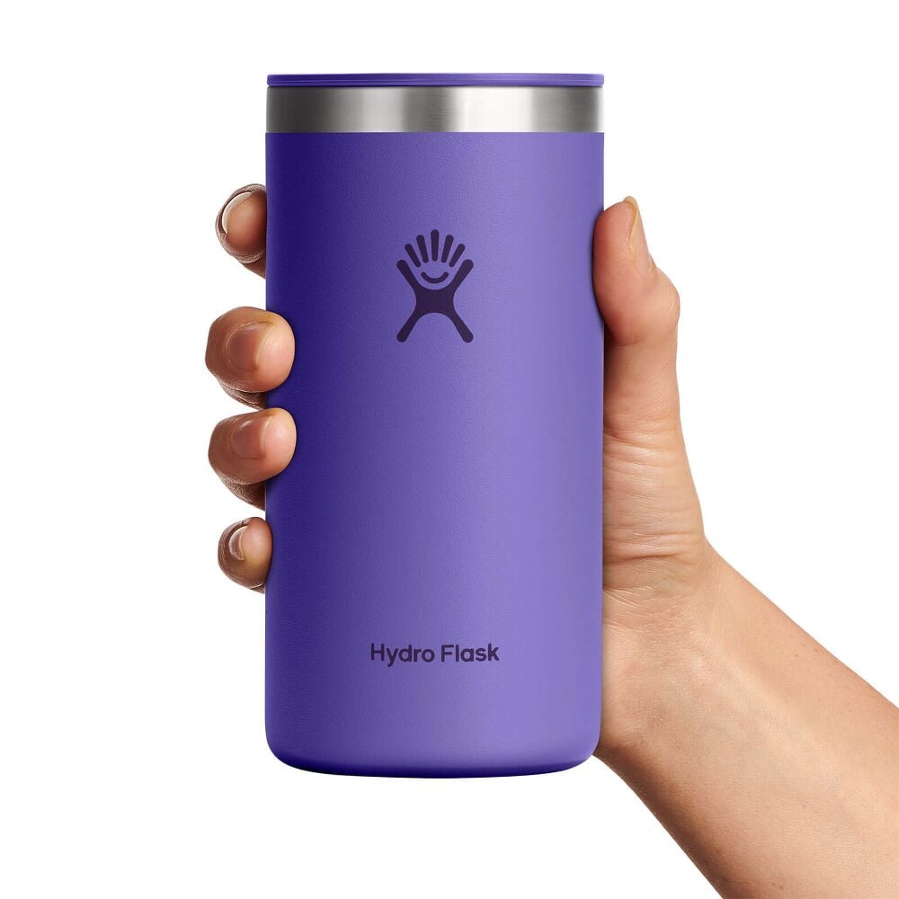 Purple Hydro Flask tumbler with stainless steel rim, matching purple sip lid, matte textured finish, and Hydro Flask logo on front. Clean cylindrical design.
