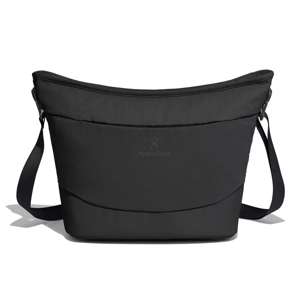 Black Hydro Flask insulated tote cooler bag with wide curved top, smooth exterior, rugged lower panel, adjustable shoulder strap with plastic hardware, and centered logo.