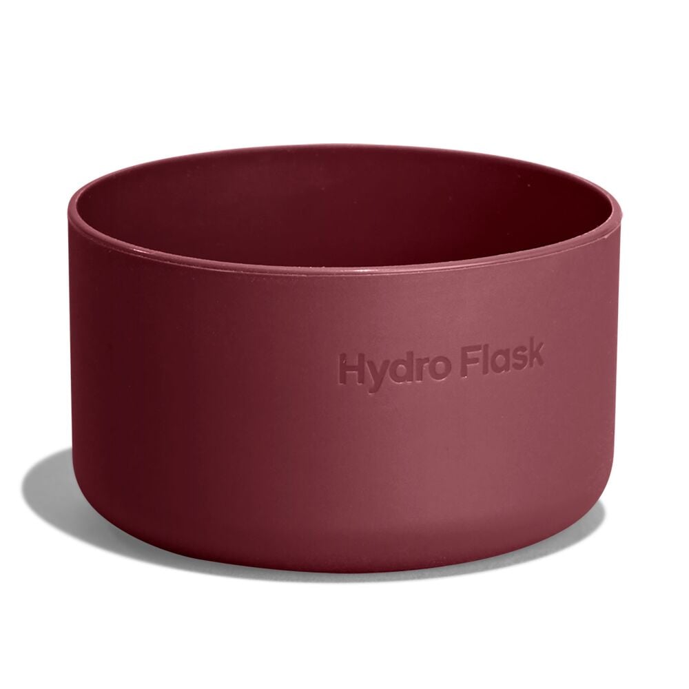 Maroon Hydro Flask silicone cup or boot with smooth matte finish, straight sides, rounded bottom edge, and embossed brand name on the side.