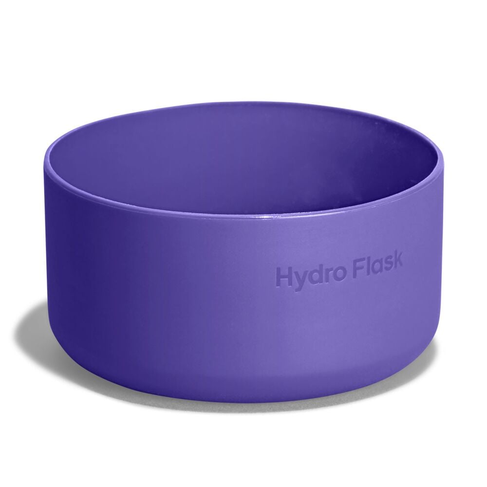 Purple Hydro Flask silicone bottle boot with smooth rounded shape, thicker base, wide open top, and "Hydro Flask" embossed on the side.