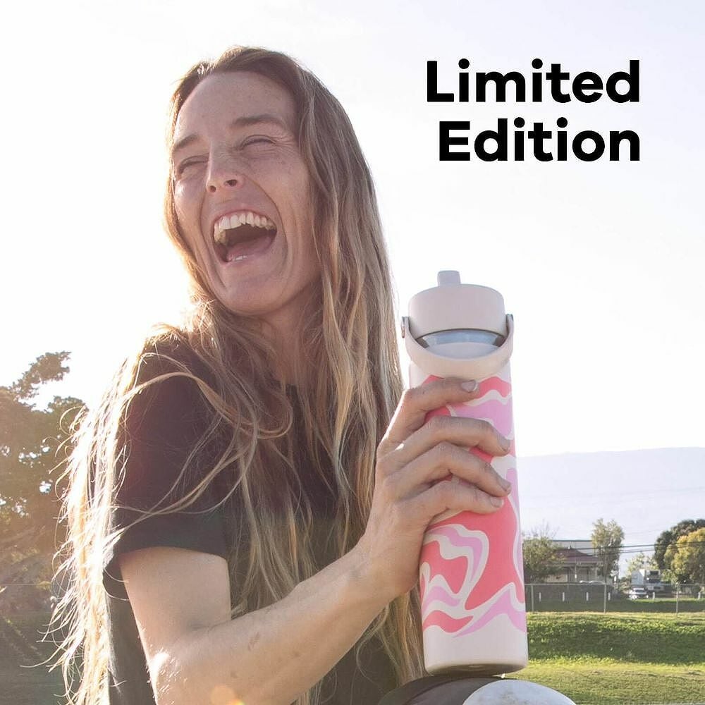 Woman outside holding Hydro Flask bottle with limited edition Callie Groove design and text overlay stating Limited Edition